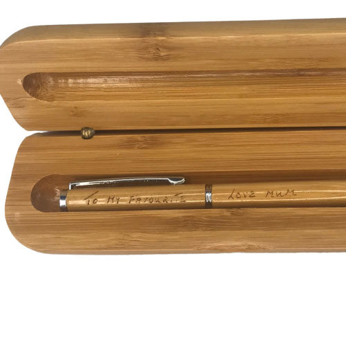 close up of personalised bamboo pen engraved with love mum