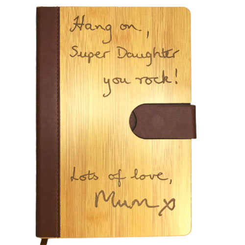 get your handwriting engraved onto a personalised bamboo notebook