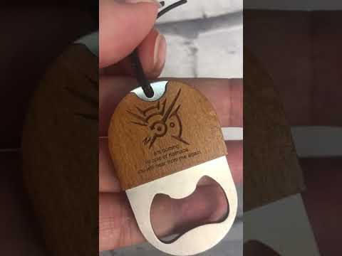 video of a personalised keyring and bottle opener