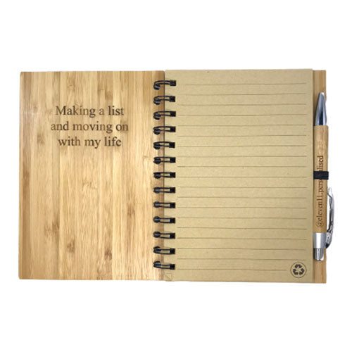 engraved personal message on the inside cover of a bamboo notebook and pen