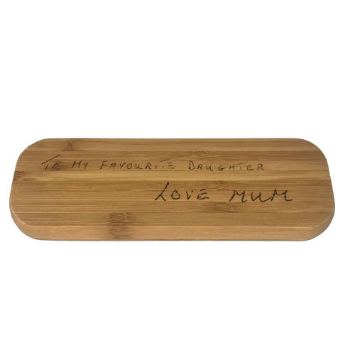 handwriting engraved on a bamboo pen case