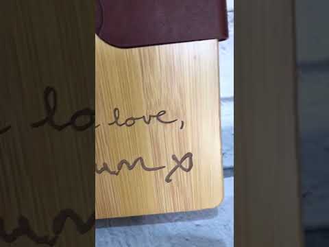 loved ones handwriting engraved on a personalised bamboo notebook