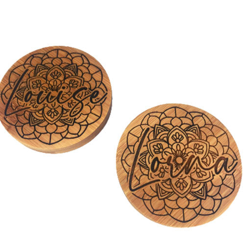 two examples of our engraved pocket mirror with mandala and name